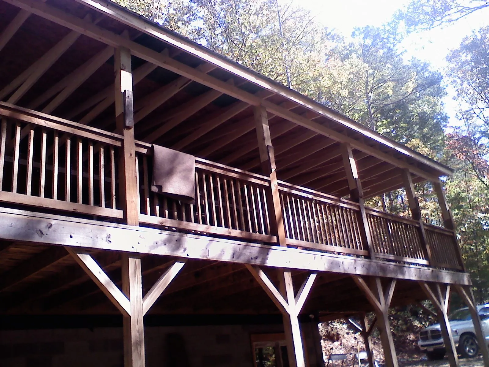 Timber framing under a new elevated porch and deck — Roof Leak Repair in Crescent by Roofing Brothers